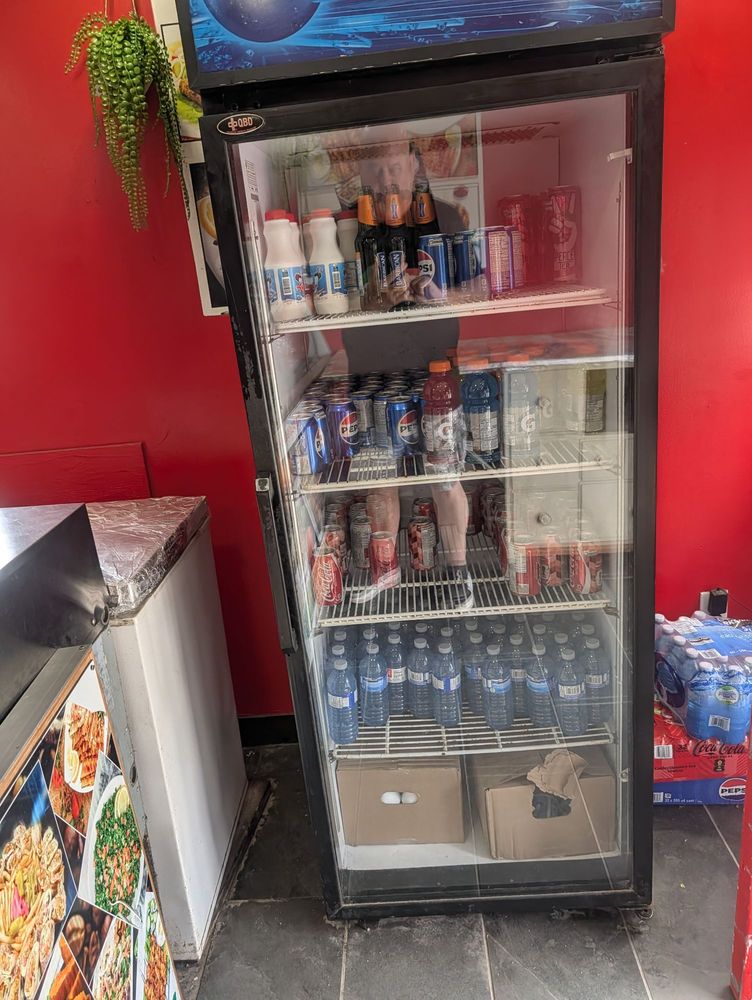 The cold drink case by the counter